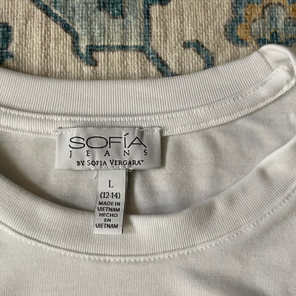 White Crewneck Short Sleeved Tee with shaping off both hips by SOFIA Vergara